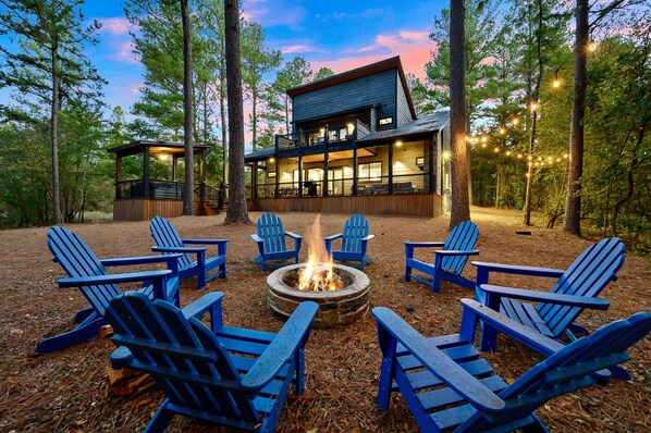 Roast marshmallows under the night sky.