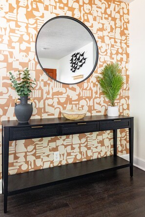 Our thoughtfully designed entryway sets the tone for a stylish and cozy stay. 