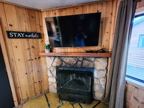Wood Burning Fireplace with 55" TV