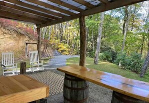 Covered outdoor kitchen and seating area. 