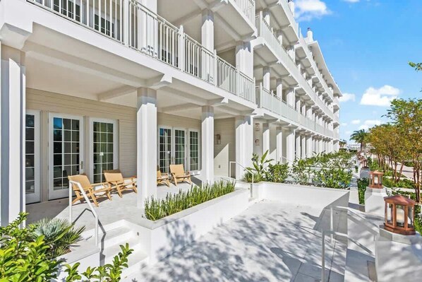 Dual Private outdoor spaces, steps to 30A.
The large covered patio, with direct access from the living area and the primary bedroom steps down to the private terrace with plenty of space for seating