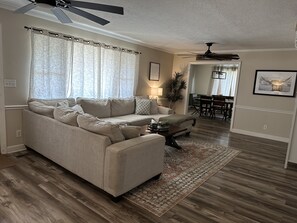 View of living room and formal dining room. 