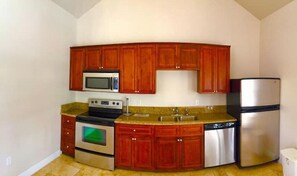  Full kitchen located in the Poolside Clubhouse.