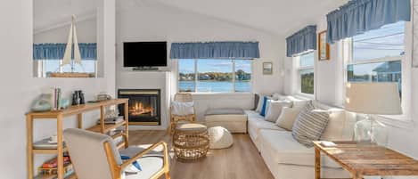 Living room with open concept and waterview