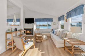 Living room with open concept and waterview