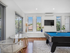 Modern Upstairs Retreat with Pool Table