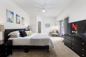 Master suite with a 55-inch TV, memory foam mattress and cozy reading nook