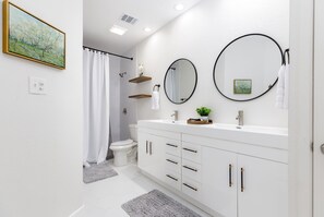 Luxurious ensuite bathroom, complete with double vanity and walk-in shower