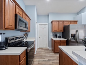 Well-equipped kitchen with updated appliances