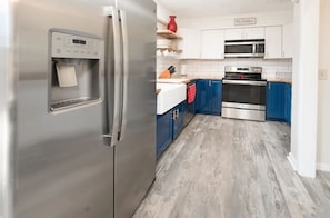 Fully equipped kitchen is waiting for you - order in, cook in or go out!