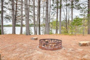 Outdoor Space | Wood-Burning Fire Pit | Private Boat Dock | Expansive Lake Views