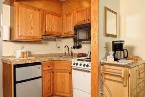 The kitchen features everything you need to cook your meals