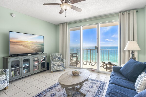 Spacious living area with plenty of seating, Queen sleeper sofa, Gulf views, 65" Smart TV with easy access to Roku, Prime TV, Netflix, etc.