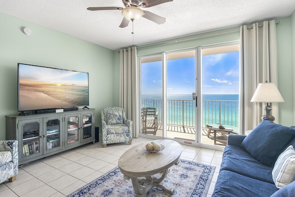 Spacious living area with plenty of seating, Queen sleeper sofa, Gulf views, 65" Smart TV with easy access to Roku, Prime TV, Netflix, etc.
