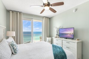 Big Gulf views from the primary bedroom which features a King Bed, new furniture, Smart TV, large closet, and private bathroom