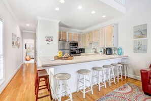 Kitchen with bar seating. 