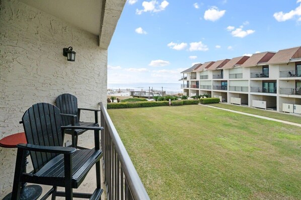 First level balcony off living area. 