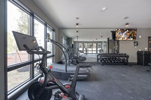 Communal Area: Gym offering a wide range of workout equipment, and a Smart TV.