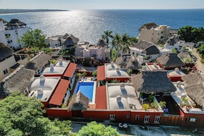6 condos share the pool. View from your private palapa