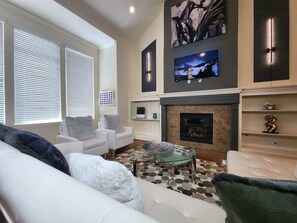 Immerse in opulence: from LED-lit walls to plush seating beneath expansive heights