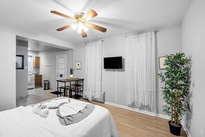 Enjoy the convenience of a dedicated work-from-home or dining area in our studio apartment. Stay entertained with a flat screen mounted smart TV and stay connected with reliable wifi.