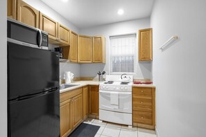 Our apartment offers a fully stocked kitchen complete with all the cooking amenities and comforts of home. You'll find a fridge, freezer, microwave, toaster, oven, stove, and coffee maker at your disposal.