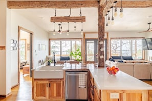 Beautiful open kitchen with views of the lake and all brand new stainless steel appliances. Fully equipped to make that special romantic dinner for 2.