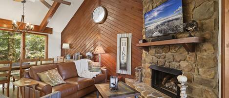 Homey Retreat: Instantly feel at home with a cozy couch, two chairs, a coffee table, a gas fireplace, and a smart TV with streaming. Cherish moments with loved ones against the backdrop of spectacular mountain views.