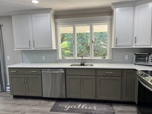 Hilltop Hideaway kitchen sink with views of the pool, keep an eye on the kiddos!
