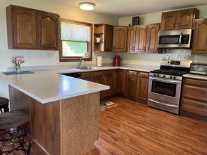 Spacious kitchen with counter seating