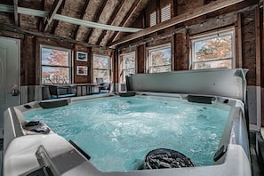 hot tub, open year round and located in it's own covered room. 