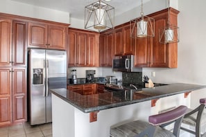 Unit may vary in layout, view, floor, and decor.