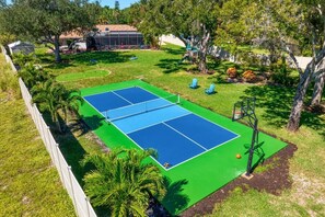 Sprawling Resort Style Backyard with Activities for All Ages