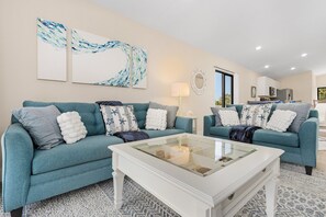 It’ll feel like home straight away when you kick back on the twin couches.