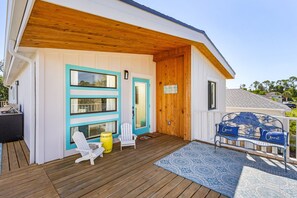 Enjoy private seating areas and great views on the front porch.