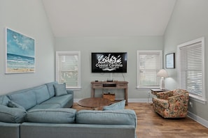 NH387C: Oak Island Cottage | Living Area, Deck Access