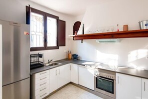 Enjoy preparing meals in a well-equipped kitchen