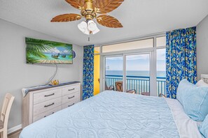 King-size bed in the oceanfront room.