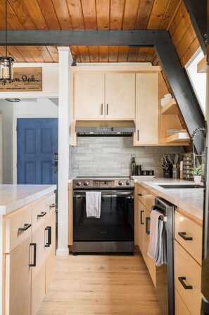 Completely remodeled kitchen with maple cabinets, brand new Samsung Oven/top.