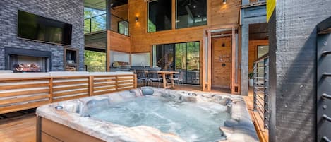 Enjoy a relaxing soak in the hot tub while watching the big game.
