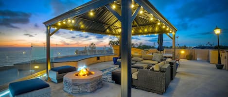 Sit around the firepit and enjoy sunsets over the Pacific on the rooftop deck.