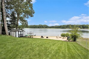 Manicured grass and gardens throughout the property.