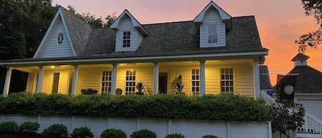 A quiet summer evening at the Pearl. The property extends around a courtyard. 