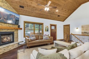 Great Room with Gas Fireplace, Smart TV, and Vaulted Tongue-and-Groove Ceilings