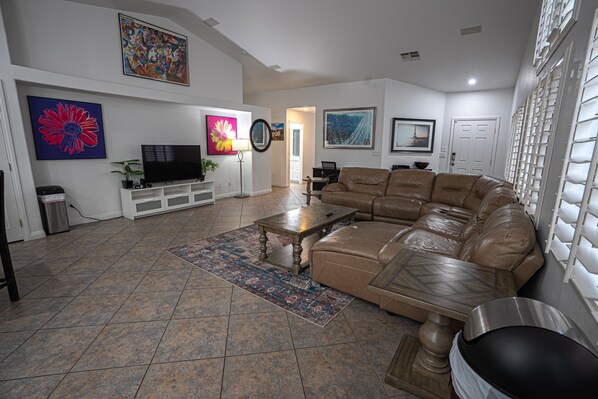 The Ultra-spacious, open-concept living area comfortably fits the family