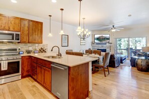 Fully Equipped Chef's Kitchen with Wood Floors