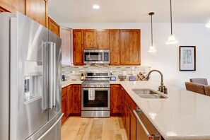 Custom Kitchen with Stainless Steel Appliances