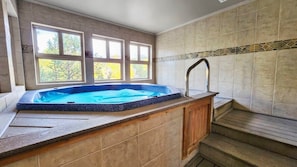 After a day on the slopes or hiking trails ease sore muscles in the shared indoor hot tub.
