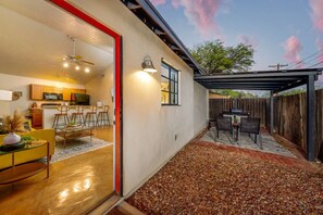 View of casita's quaint, private, and fully fenced front yard