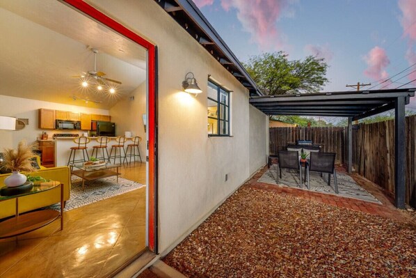 View of casita's quaint, private, and fully fenced front yard